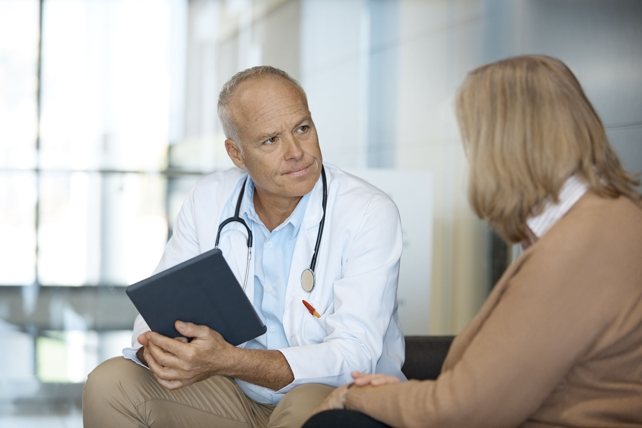 doctor discussing a patient's medical history